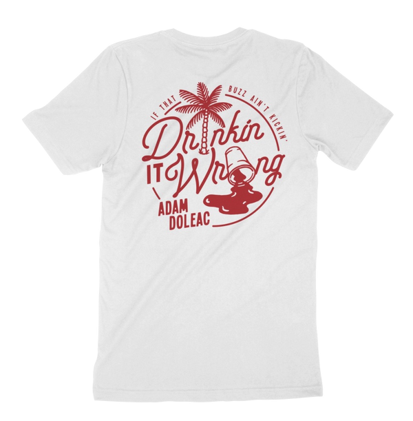 Drinkin' It Wrong spilled cup palm tree red and white tee product shot back Adam Doleac